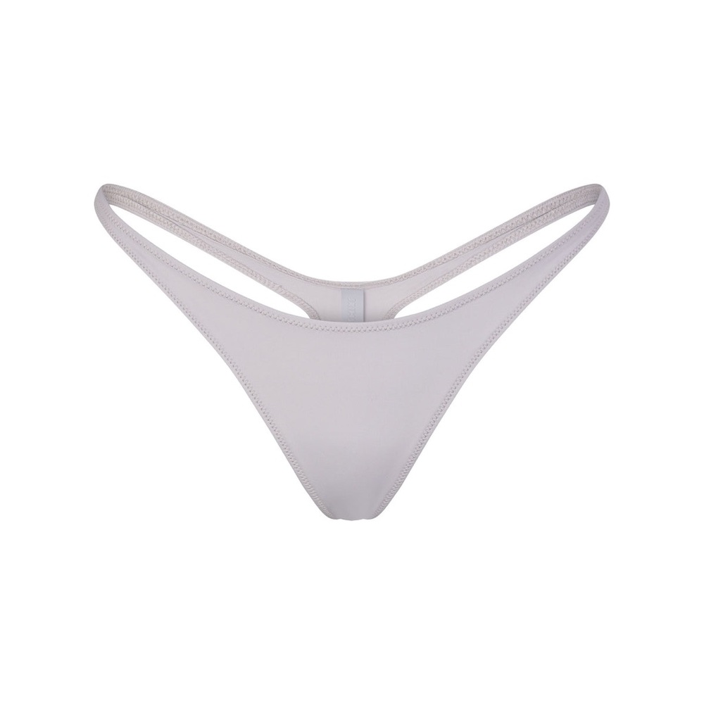 Beautiful thong bikini bottom by skim. Color chrome. New with tag.